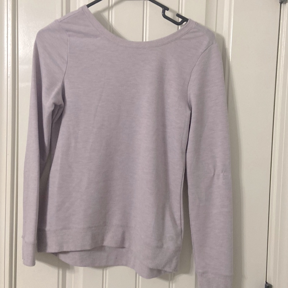 Girls purple athletic sweatshirt with cris cross back
